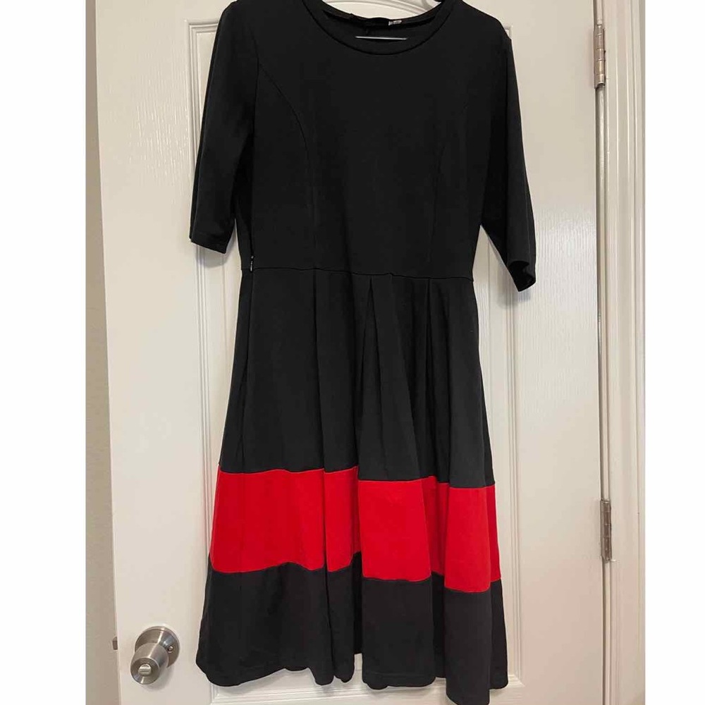 3/4 sleeve black dress with red stripe